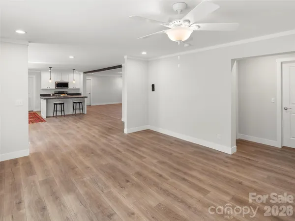 a view of kitchen with microwave and furniture