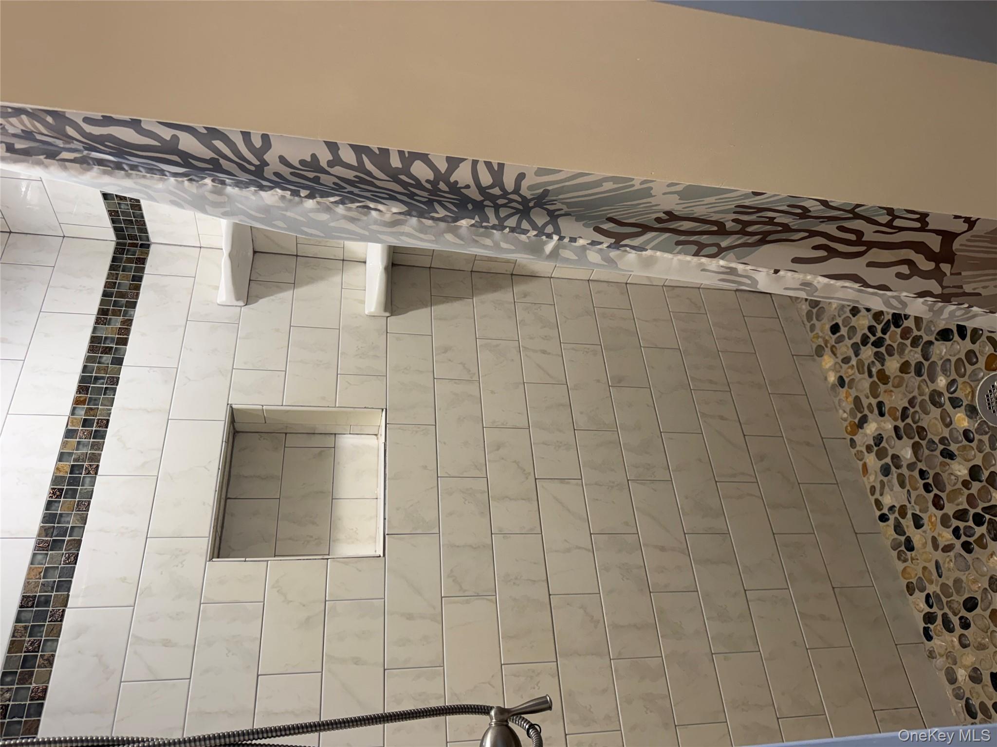 55 Lester Avenue Freeport, NY 11520 - Photo 15 of 38 a bathroom with a shower curtain and a sink