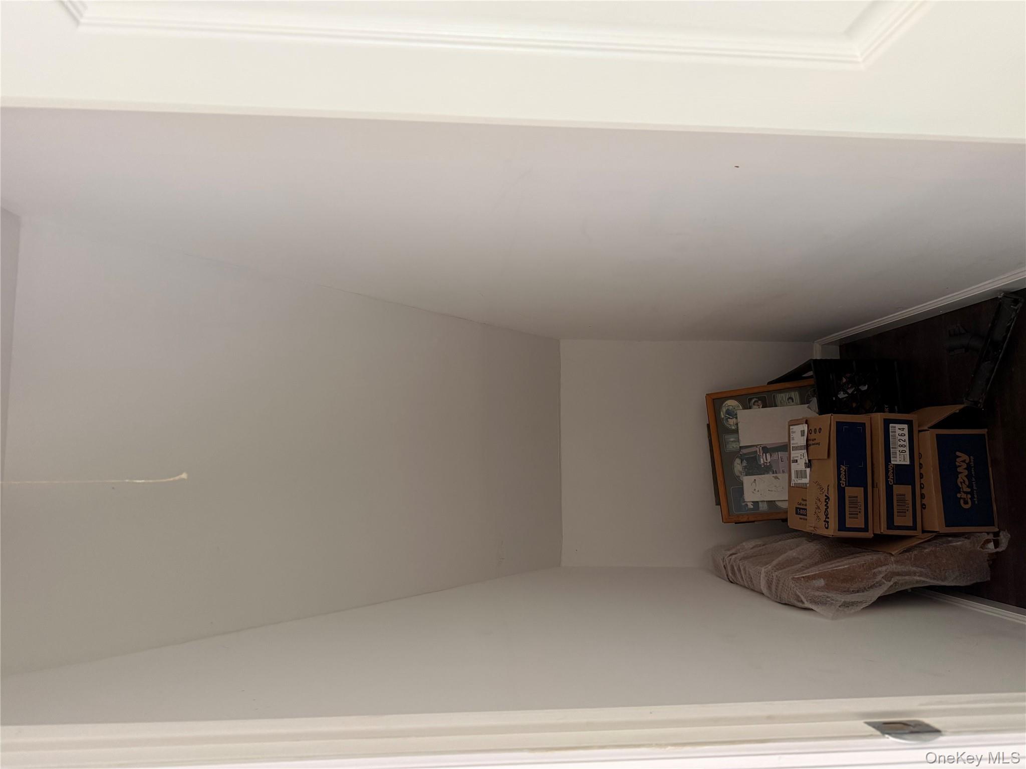 55 Lester Avenue Freeport, NY 11520 - Photo 16 of 38 a room with a bed