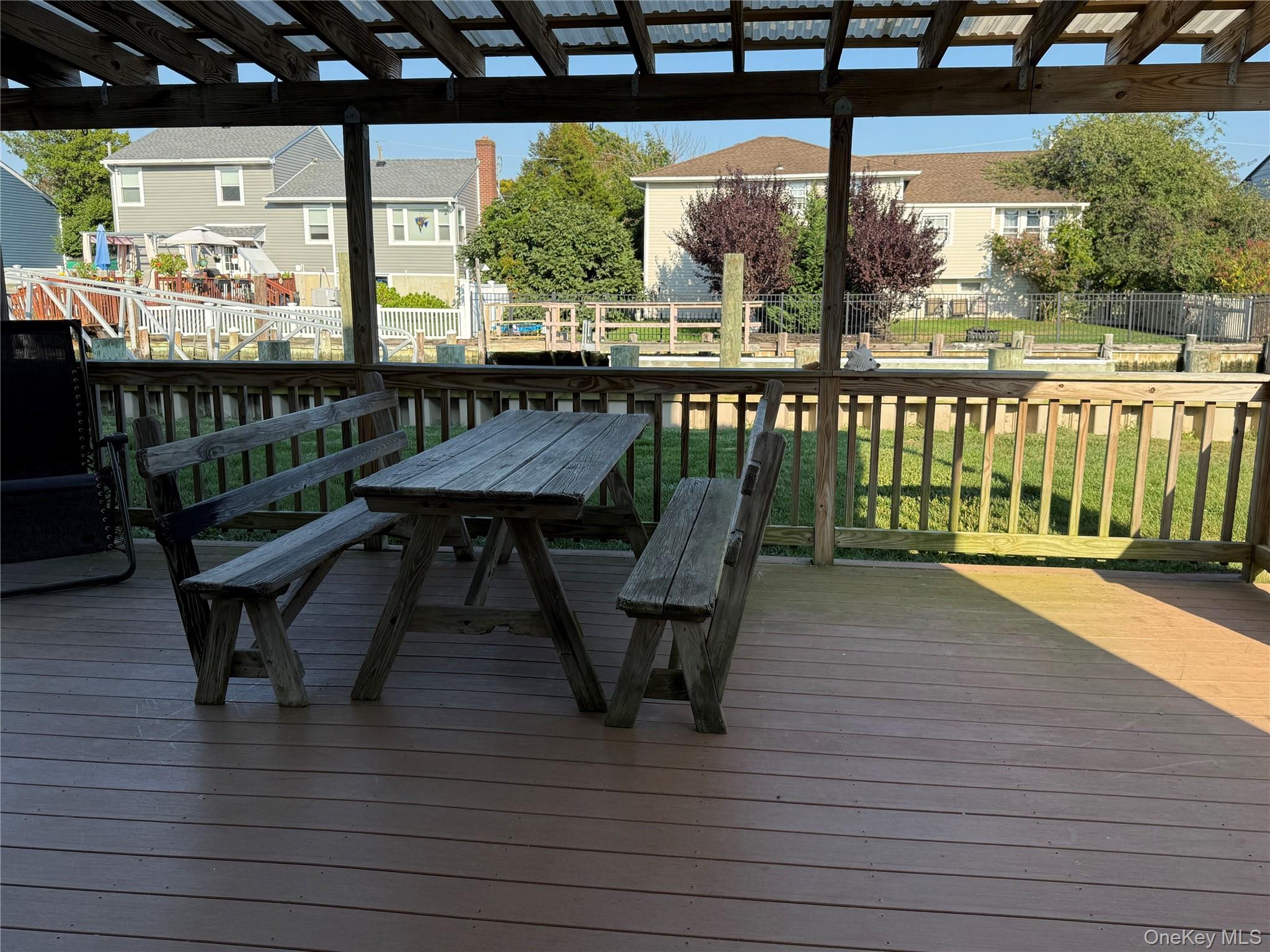55 Lester Avenue Freeport, NY 11520 - Photo 17 of 38 a view of a balcony with chairs