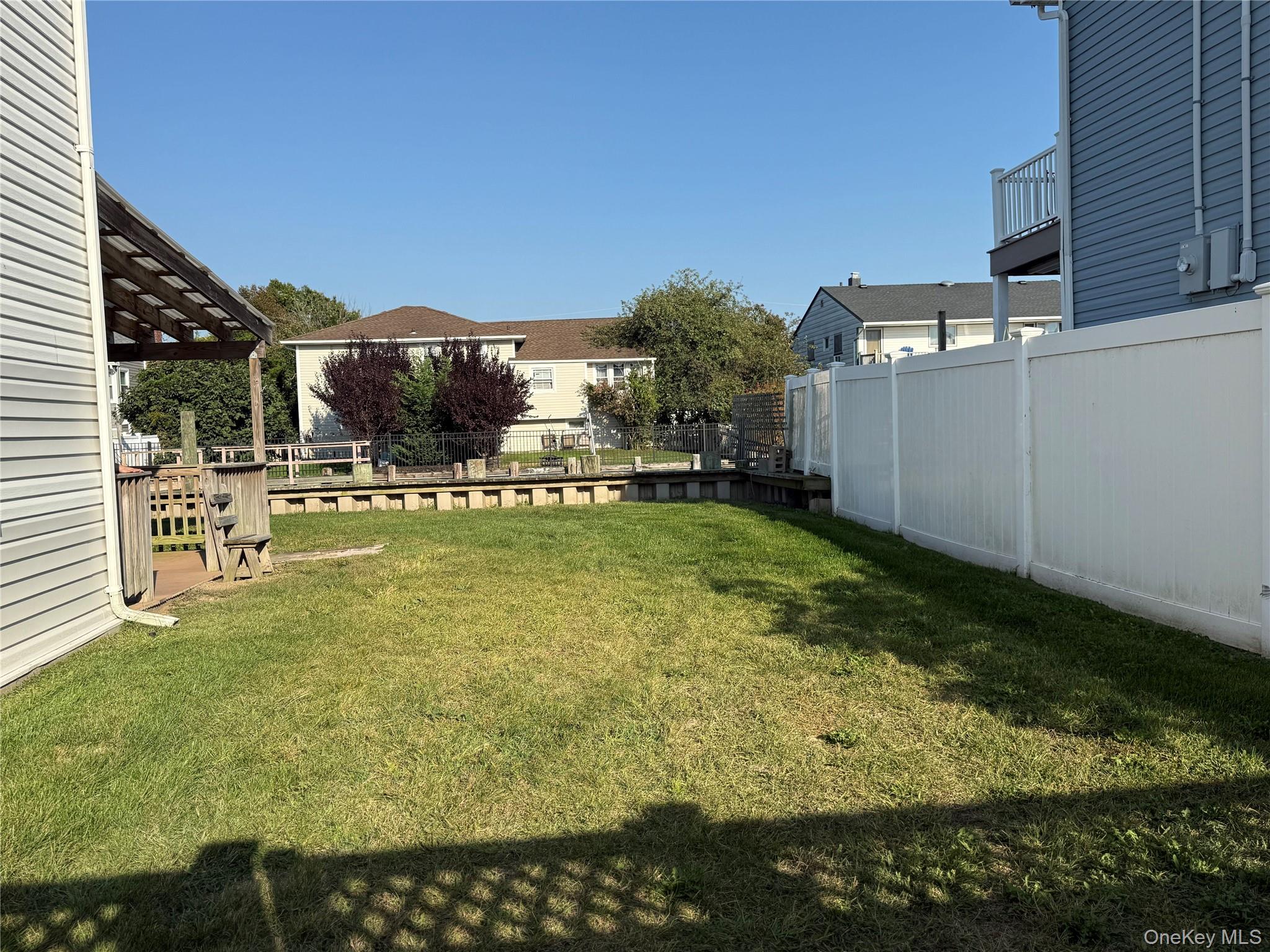 55 Lester Avenue Freeport, NY 11520 - Photo 19 of 38 a view of a outdoor space