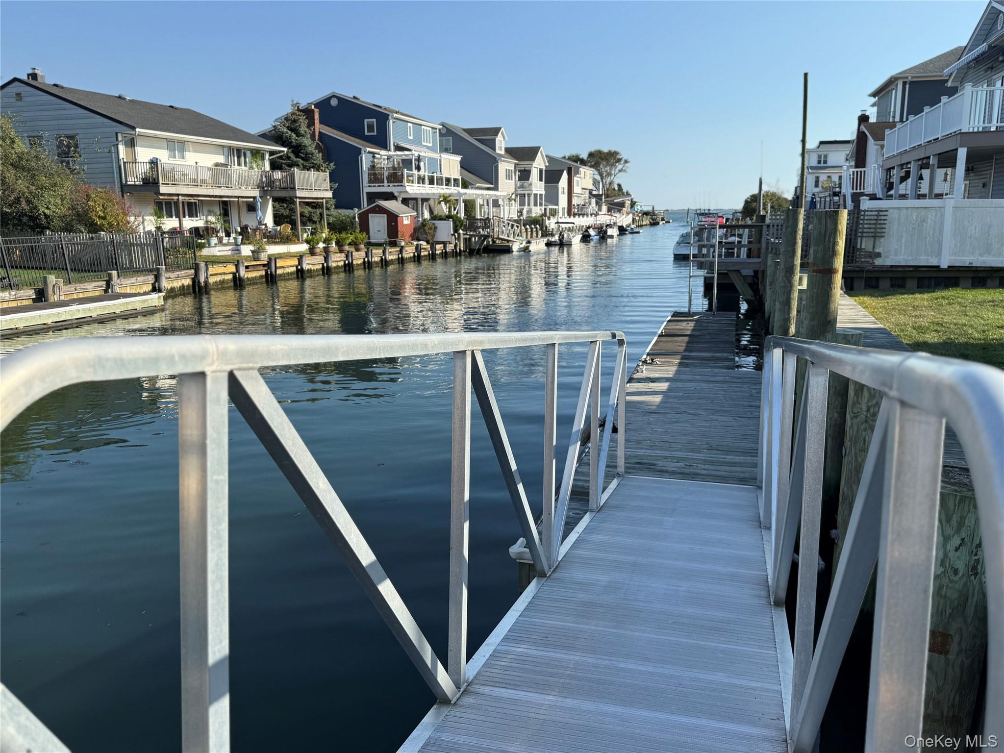 55 Lester Avenue Freeport, NY 11520 - Photo 22 of 38 a view of swimming pool from a balcony
