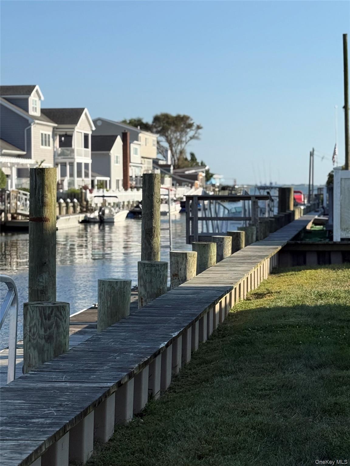 55 Lester Avenue Freeport, NY 11520 - Photo 23 of 38 a view of swimming pool with outdoor seating