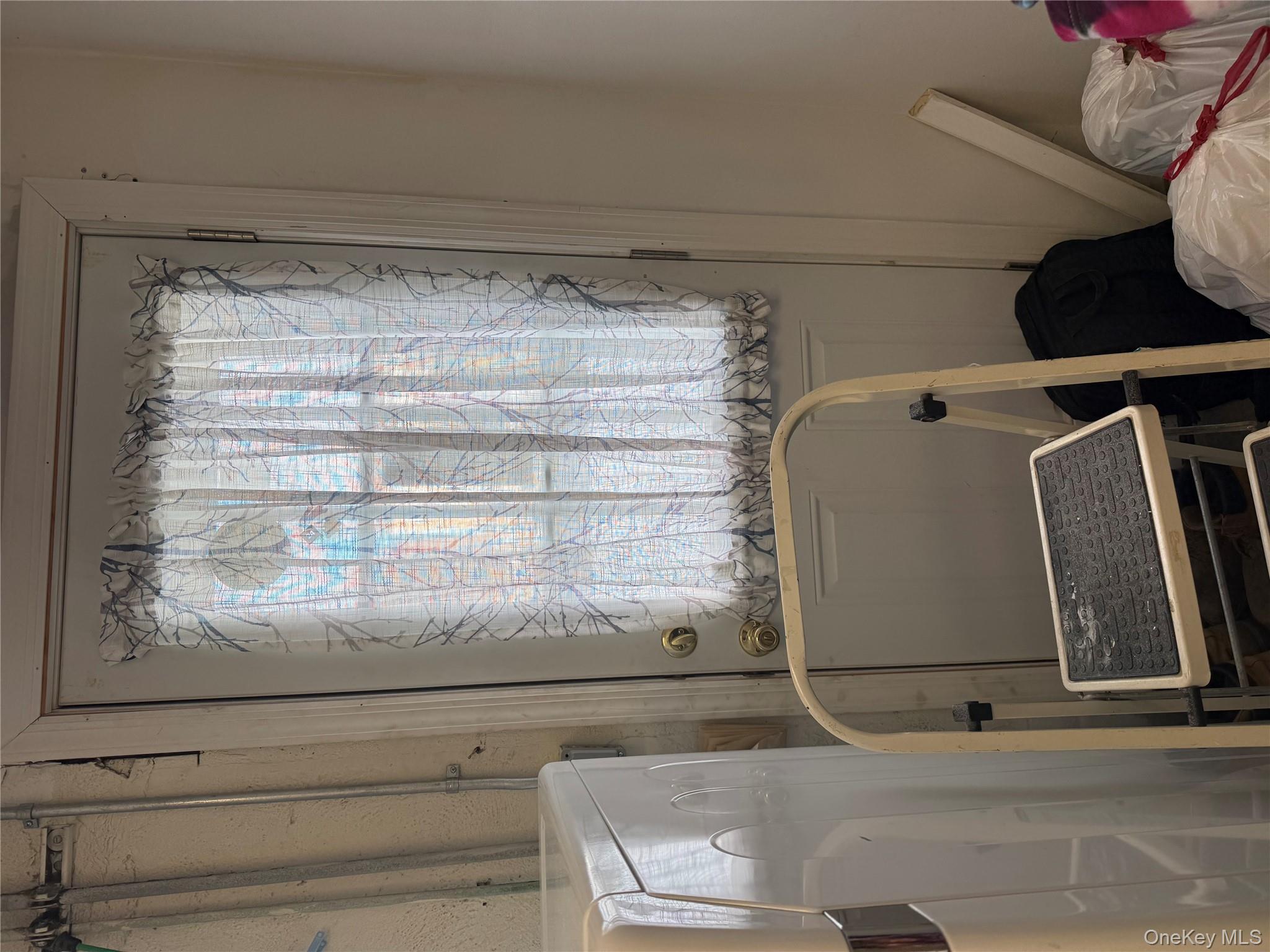 55 Lester Avenue Freeport, NY 11520 - Photo 36 of 38 a room with furniture and a window