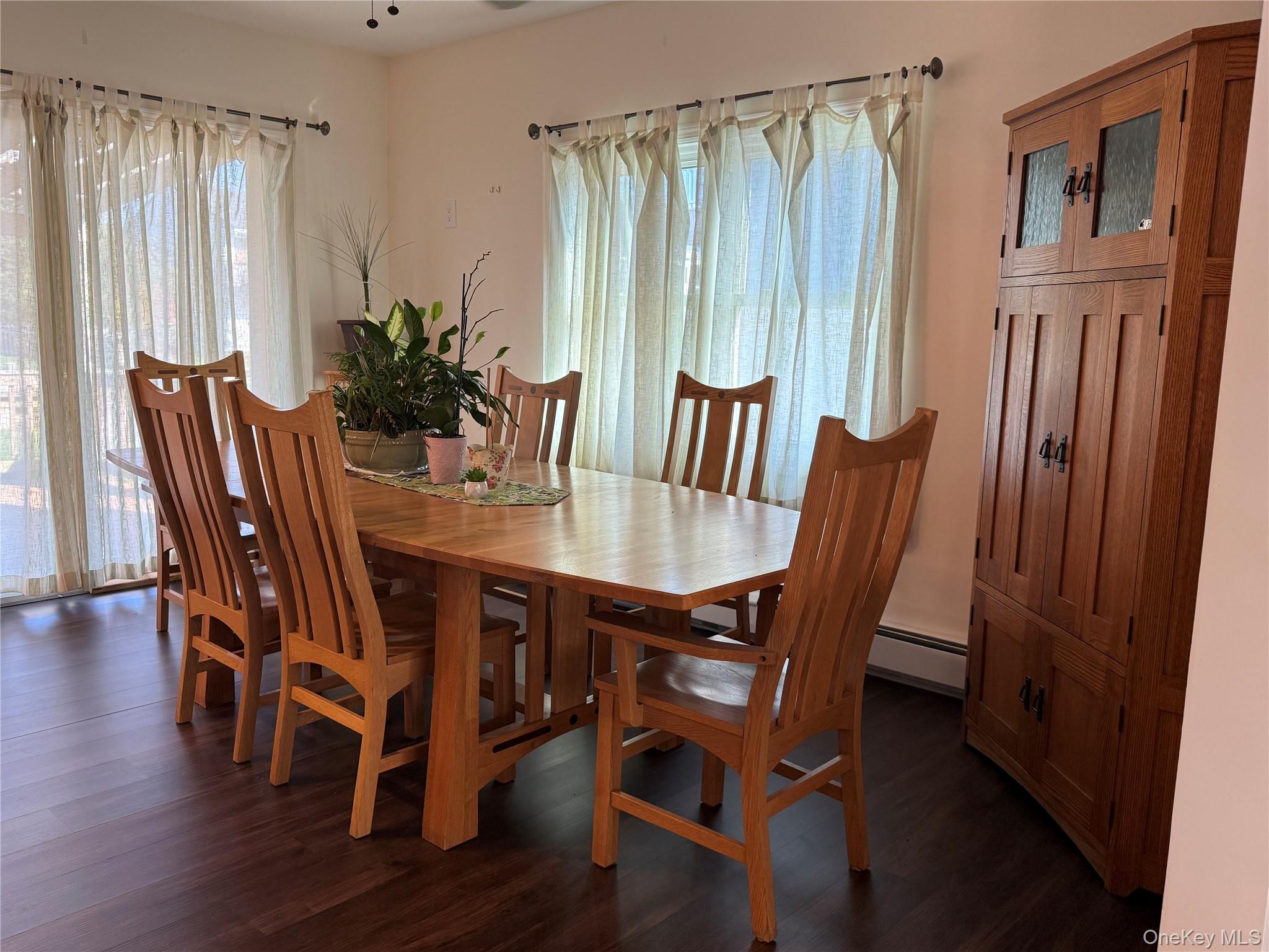 55 Lester Avenue Freeport, NY 11520 - Photo 8 of 38 a view of a dining room with furniture window and wooden floor