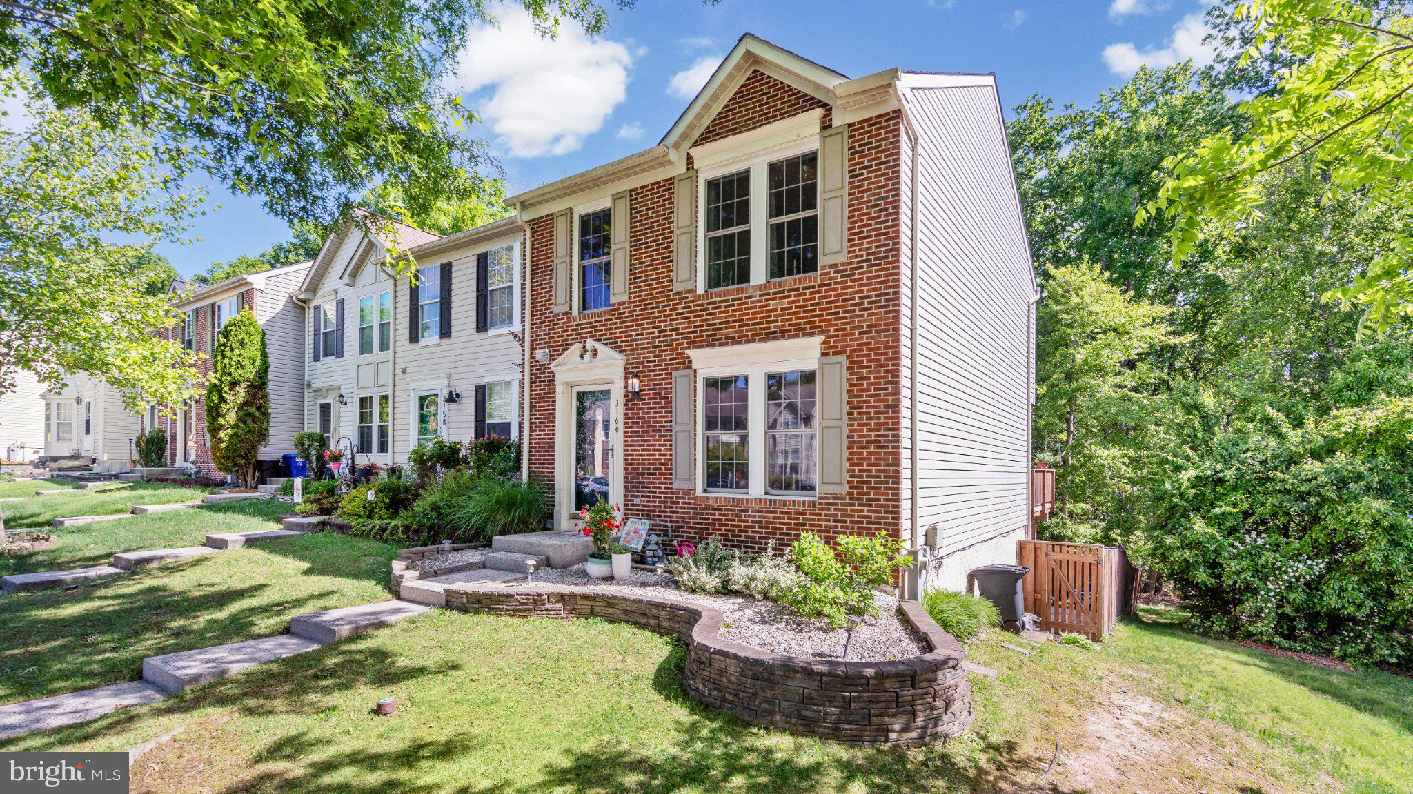 3160 Hidden Ridge Terrace Abingdon, MD 21009 - Photo 2 of 41 Charming brick home with lush greenery.