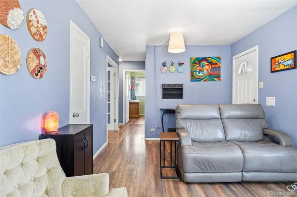 a living room with furniture and a couch