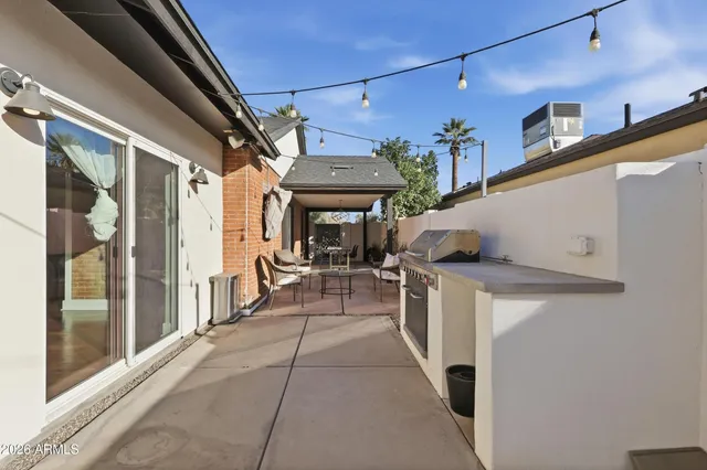 a dining room with furniture window and outside view