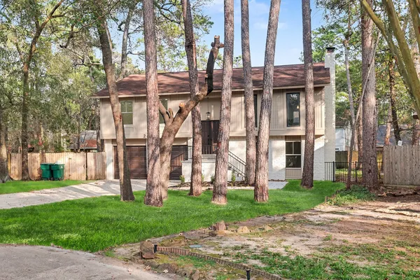 front view of a building with a yard