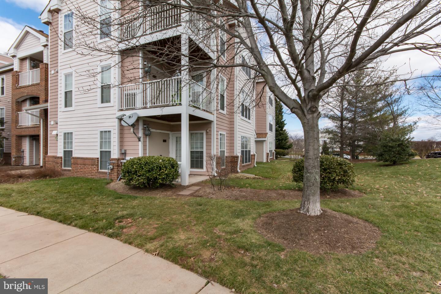 20960 Timber Ridge Terrace, Unit 102 Ashburn, VA 20147 - Photo 1 of 19 Exterior (Front)