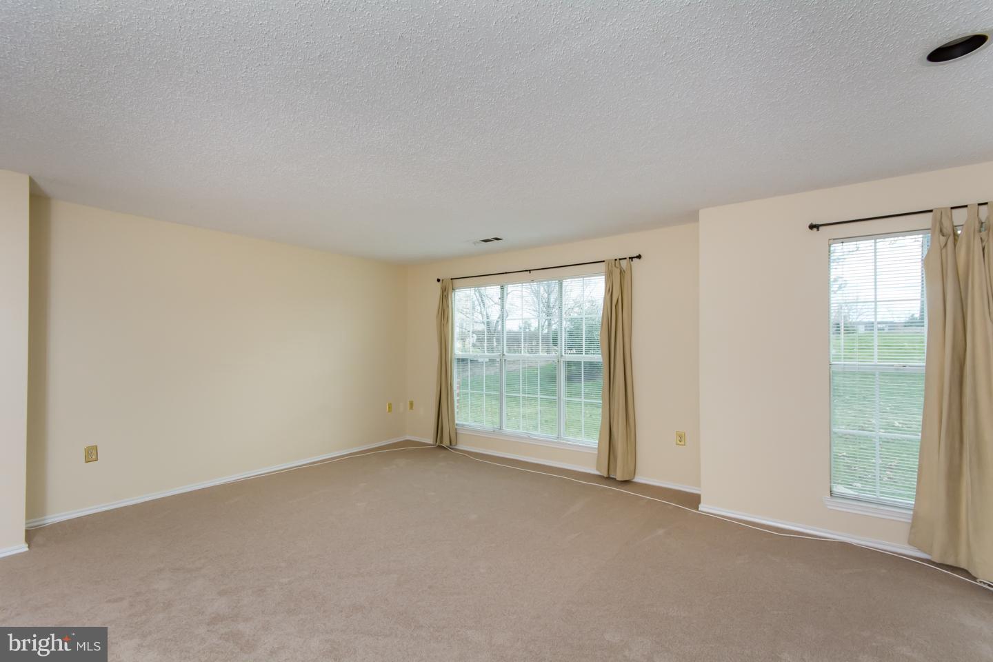 20960 Timber Ridge Terrace, Unit 102 Ashburn, VA 20147 - Photo 4 of 19 Family Room