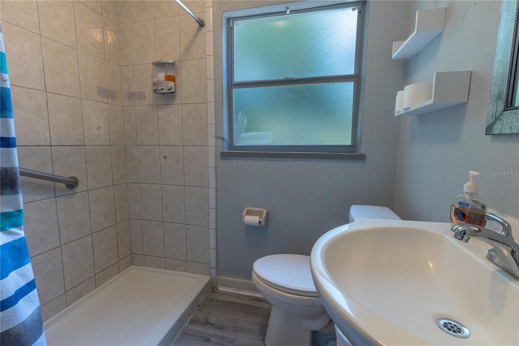 123 Oconee Street Lakeland, FL 33805 - Photo 20 of 25 a bathroom with a sink and mirror