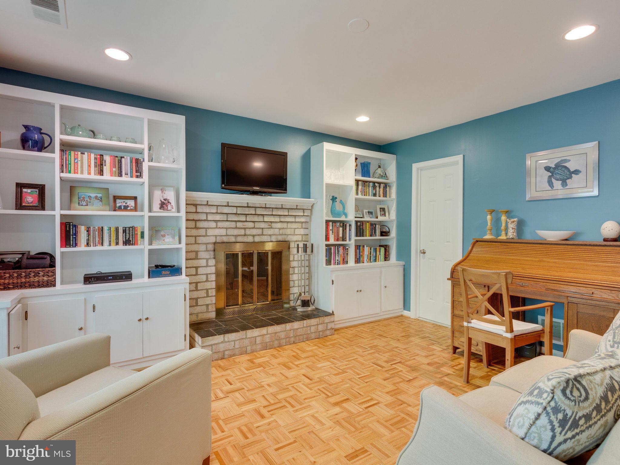 11421 Vale Road Oakton, VA 22124 - Photo 9 of 25 Living Room w Wood-burning Fireplace