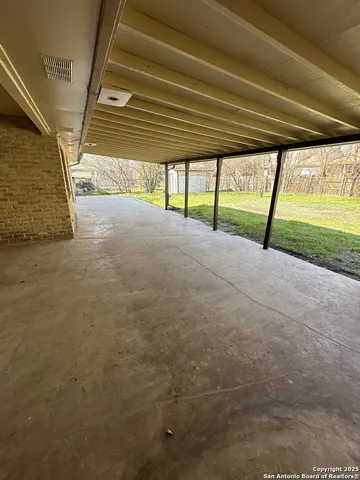 a view of backyard with green space