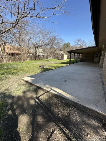 a view of a yard with an outdoor space