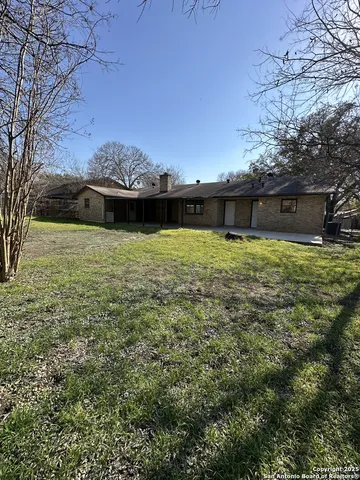 a view of an outdoor space and a yard