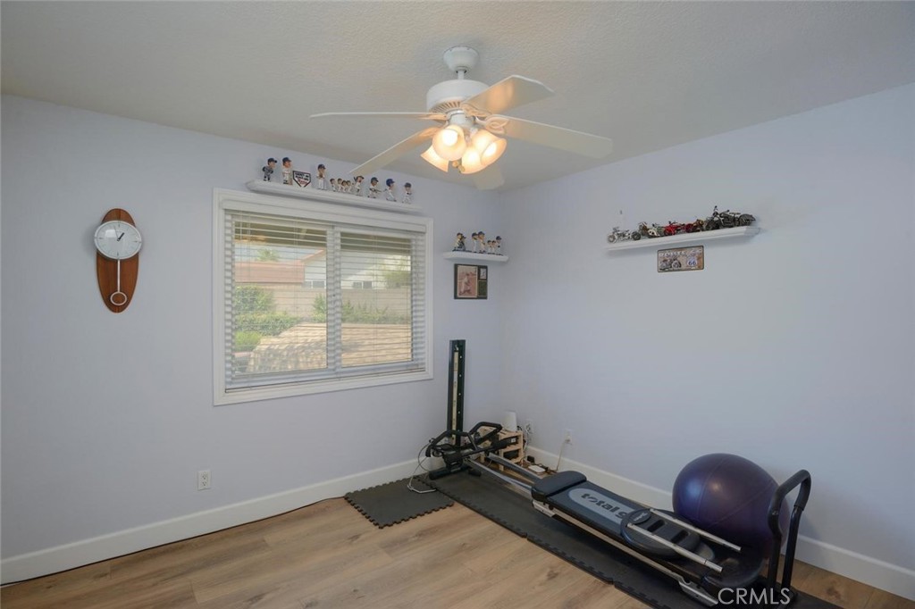 10424 Cartilla Court Rancho Cucamonga, CA 91737 - Photo 18 of 36 a room with gym equipment and a window