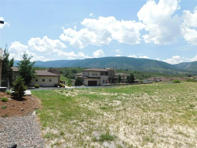 a view of a lake with a mountain in the background