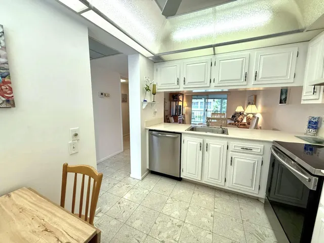 a view of a living room and dining room