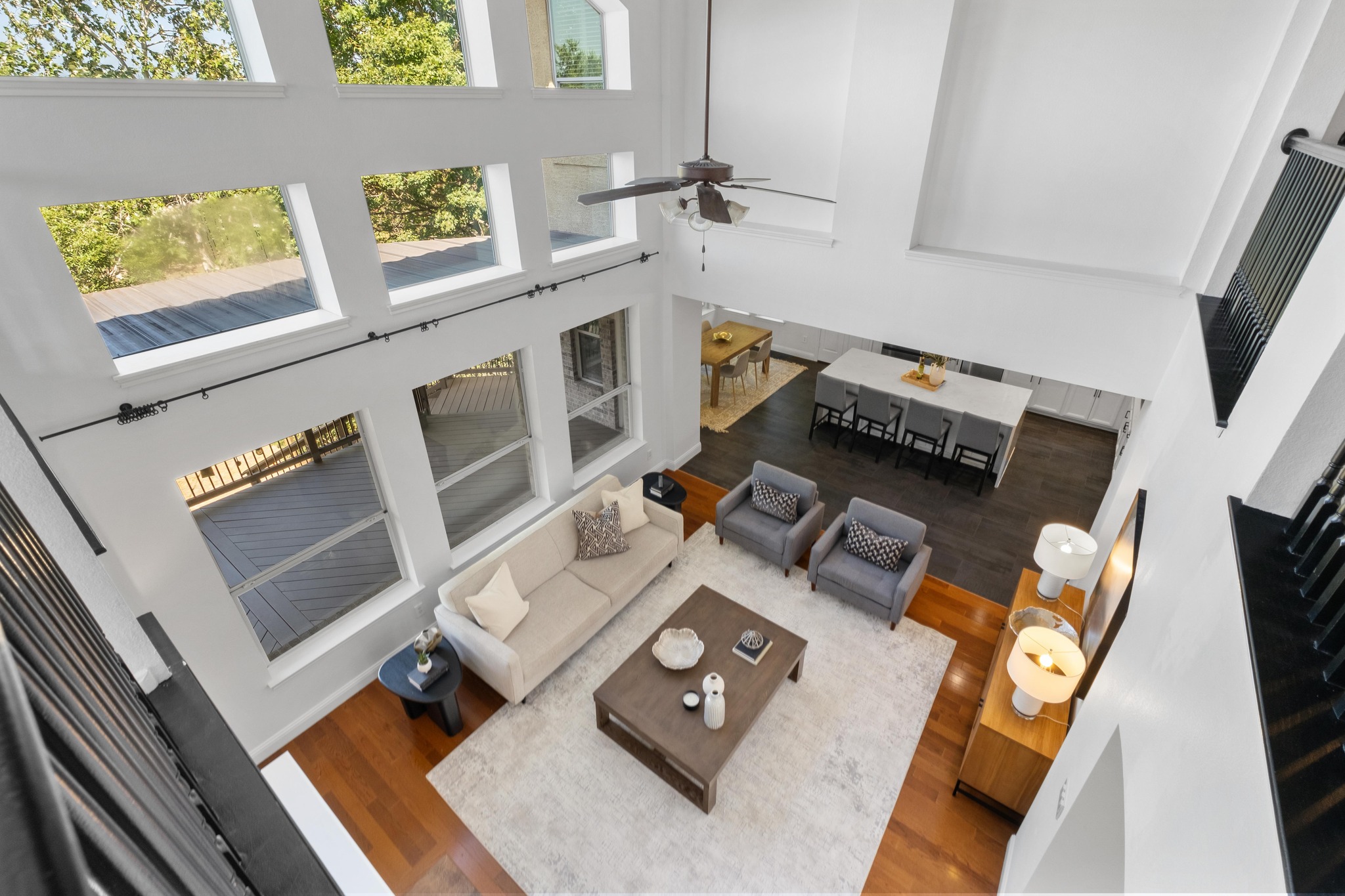 16200 Spillman Ranch Loop Austin, TX 78738 - Photo 11 of 36 Grand open-concept living space with soaring ceilings and an abundance of natural light.