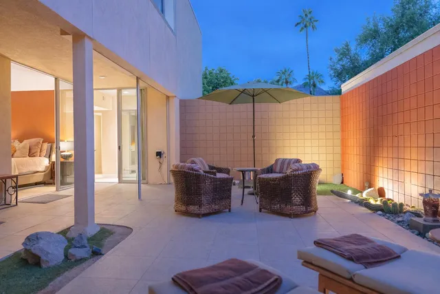 a outdoor living space with furniture and a garden