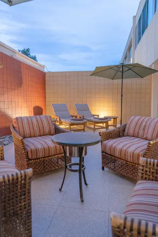 a living room with a couch and a table
