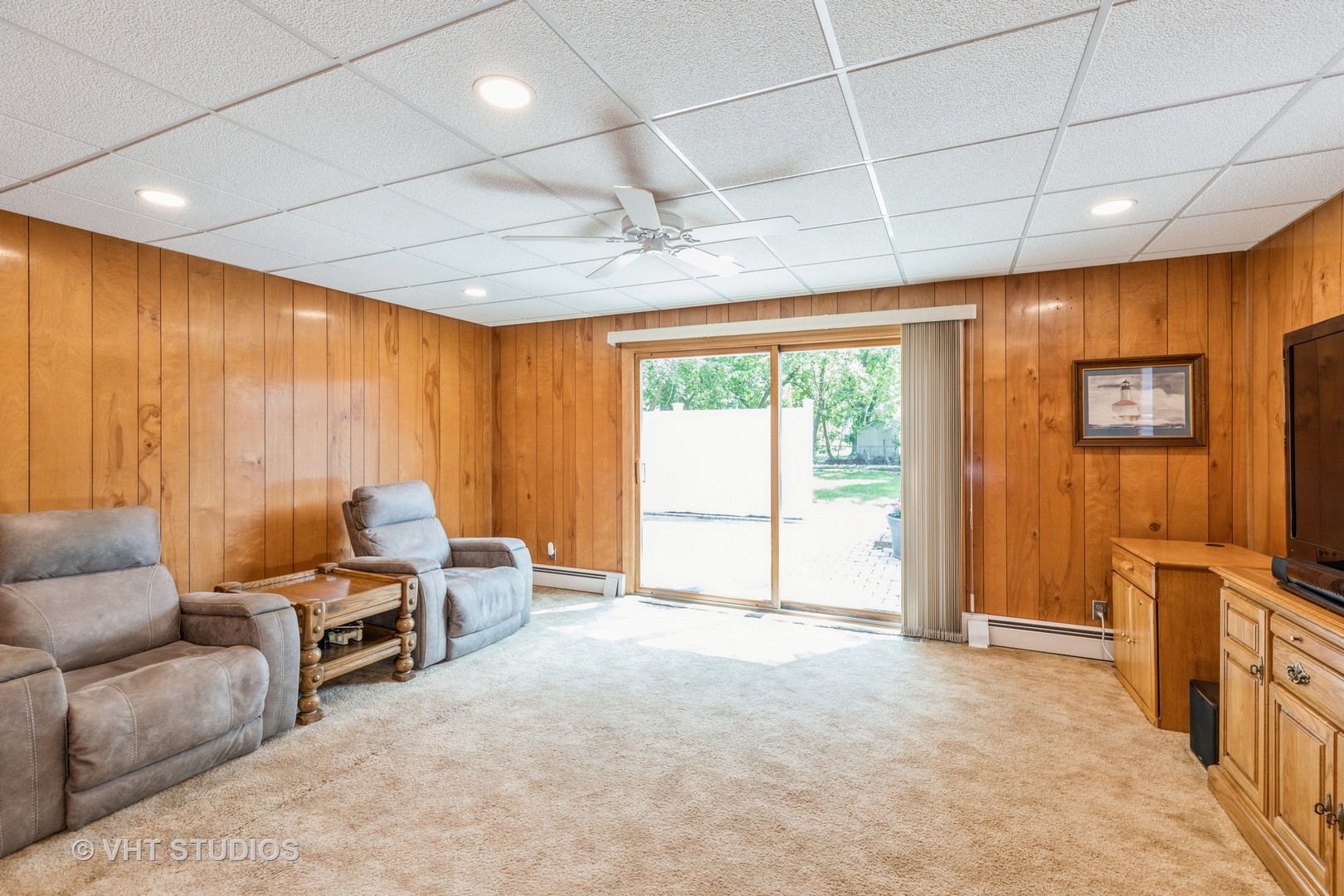 1345 Hickory Road Homewood, IL 60430 - Photo 11 of 28 a living room with furniture a flat screen tv and a window