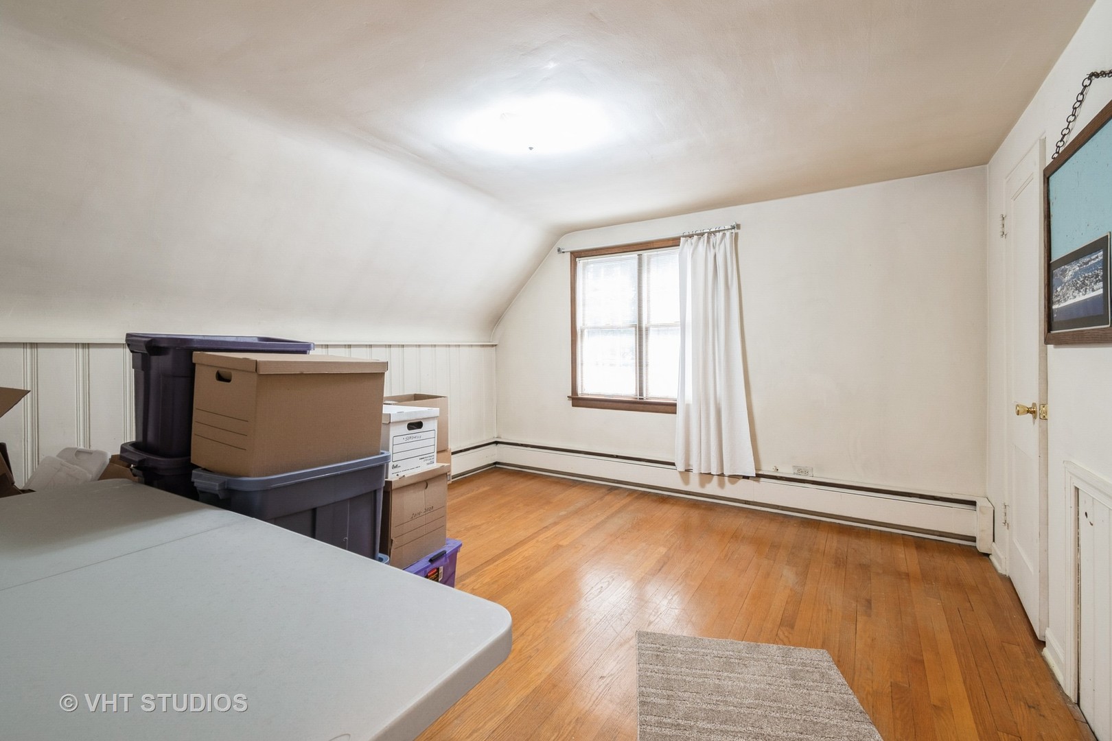 1345 Hickory Road Homewood, IL 60430 - Photo 14 of 28 a view of an empty room with a window and wooden floor