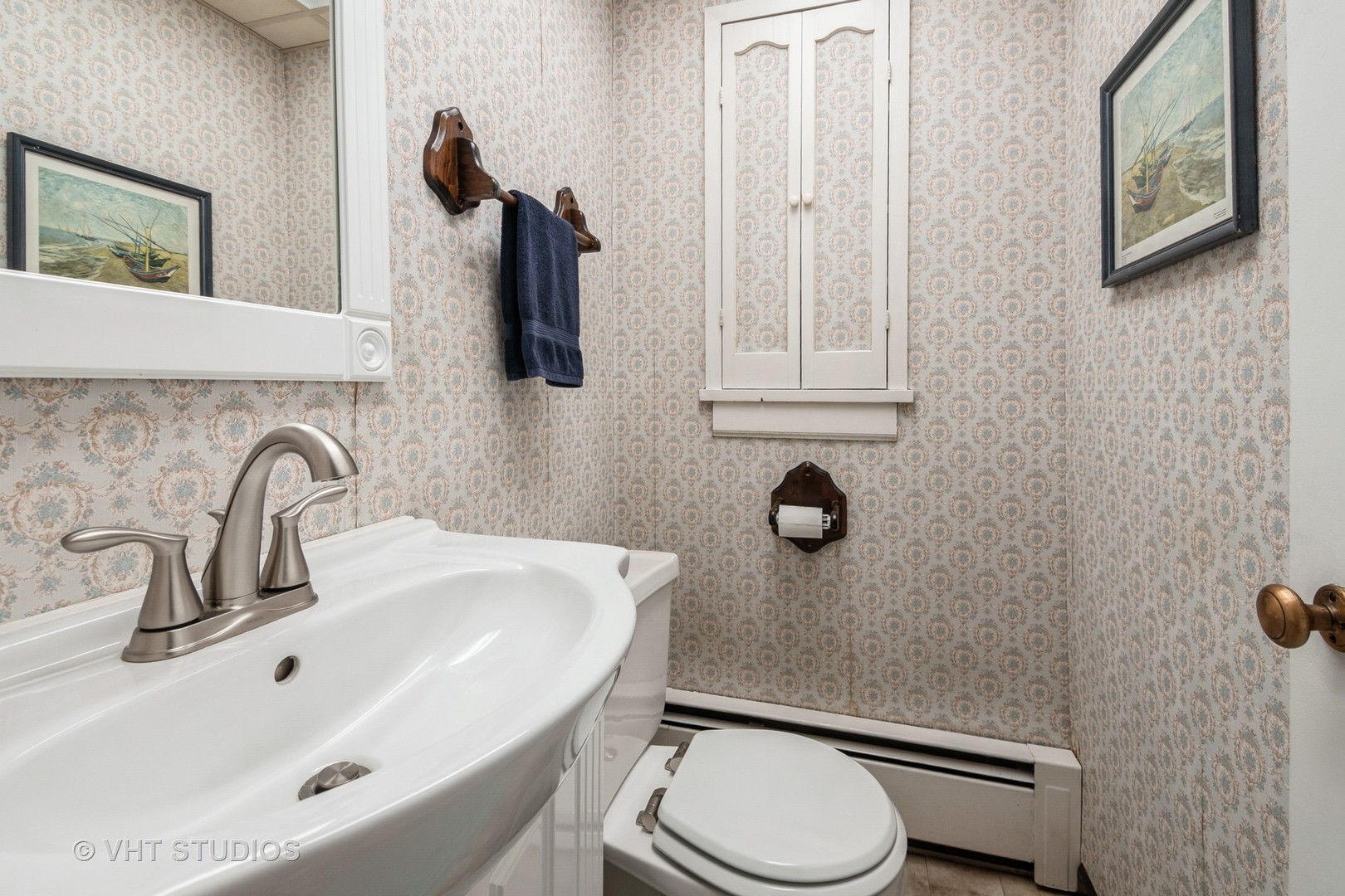 1345 Hickory Road Homewood, IL 60430 - Photo 20 of 28 a bathroom with a sink toilet and mirror