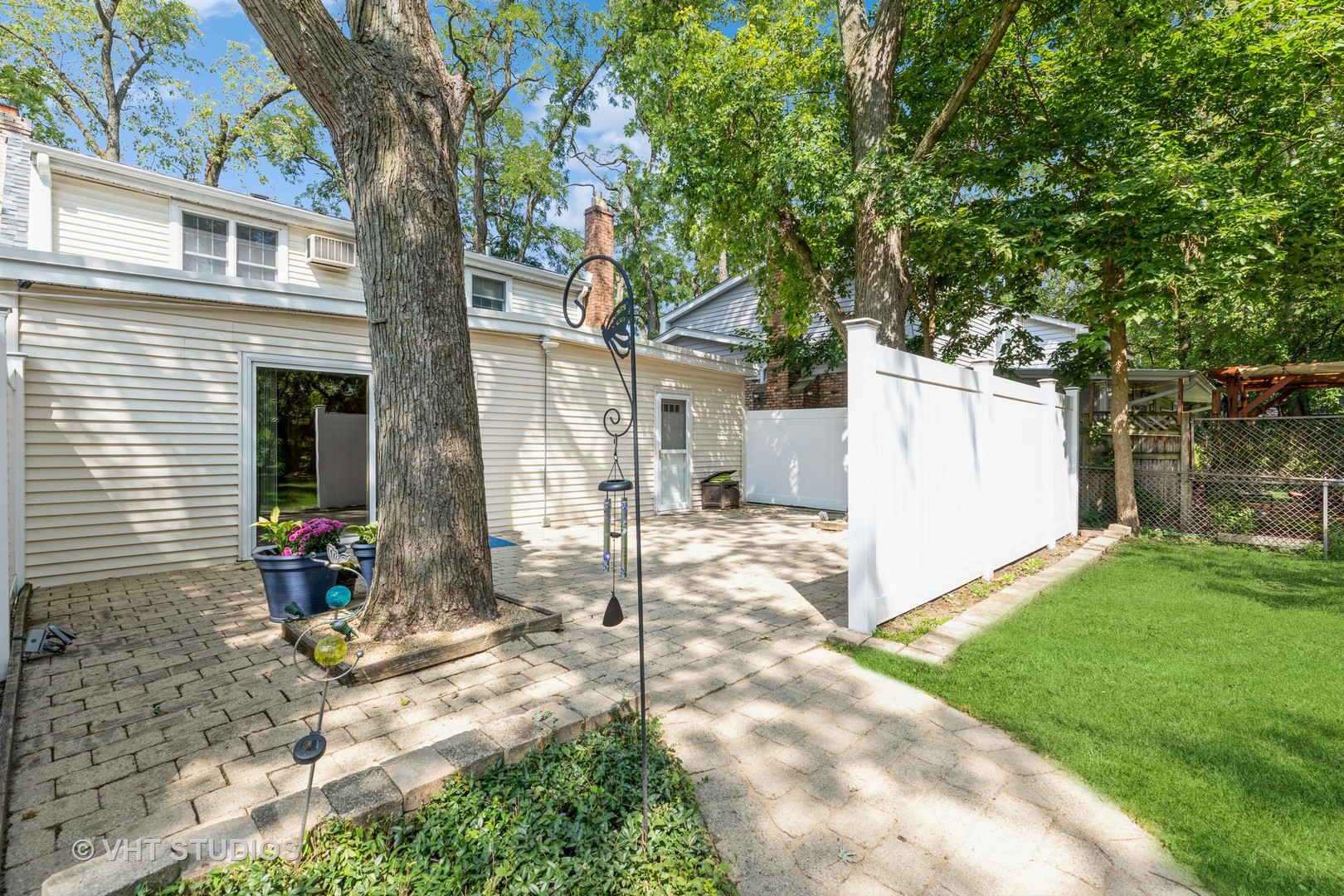 1345 Hickory Road Homewood, IL 60430 - Photo 22 of 28 a view of a house with backyard and a tree