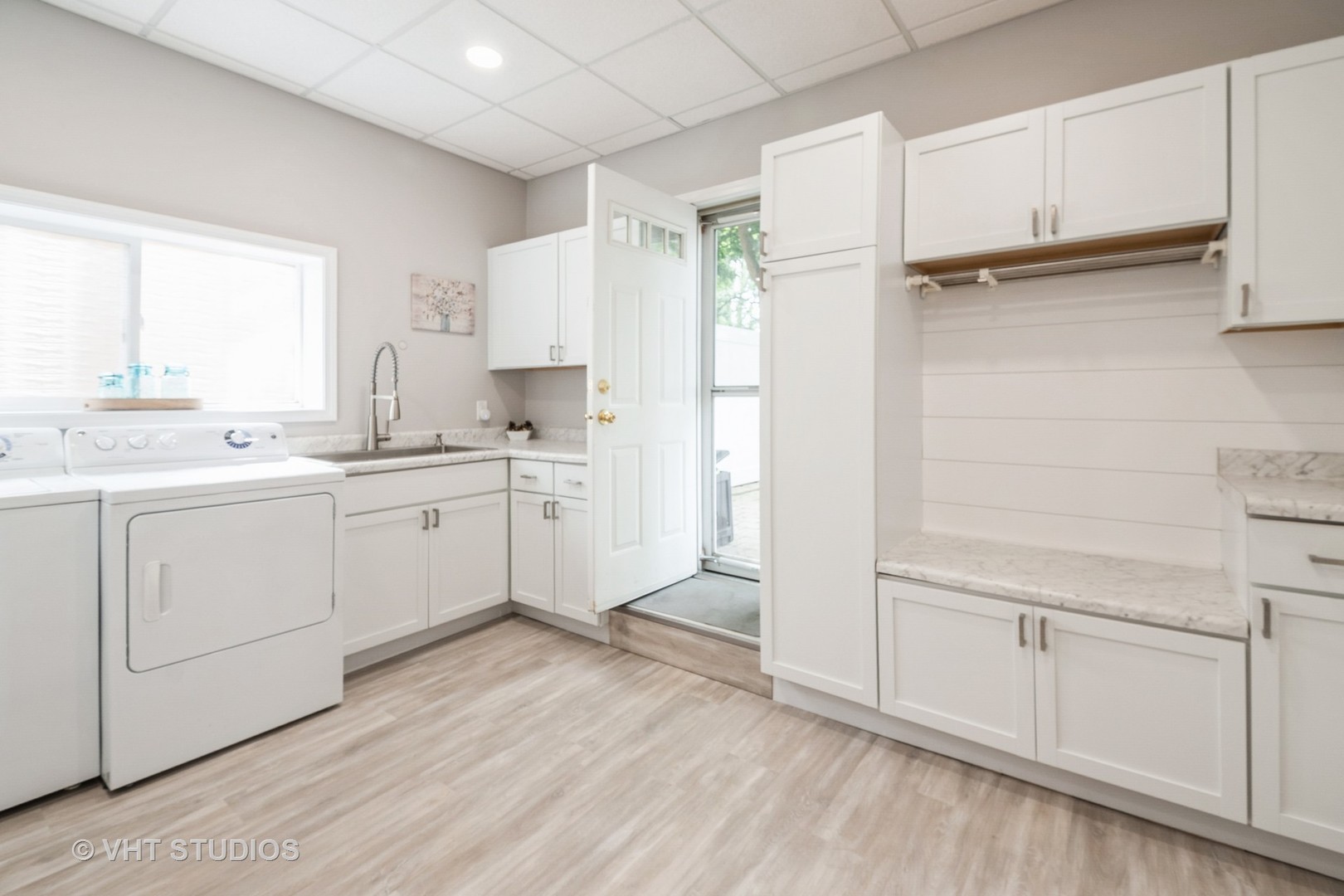 1345 Hickory Road Homewood, IL 60430 - Photo 27 of 28 a view of cabinets a sink and dishwasher in a white cabinet
