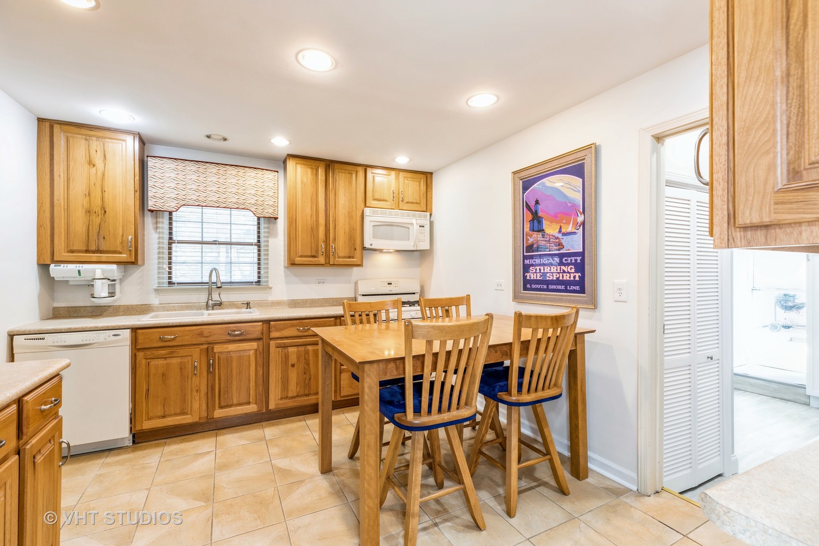 1345 Hickory Road Homewood, IL 60430 - Photo 6 of 28 a view of a kitchen area with furniture and window