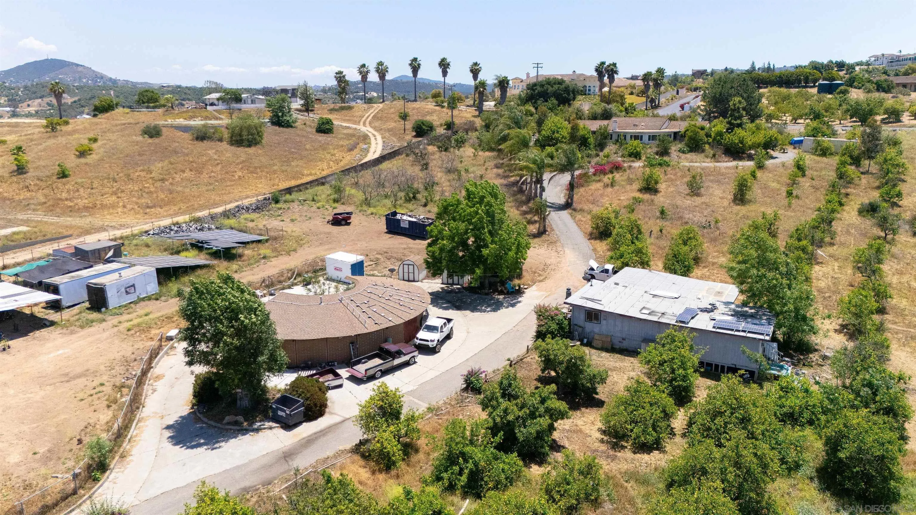 10171 Circle R Drive Valley Center, CA 92082 - Photo 3 of 19 an aerial view of residential houses with outdoor space