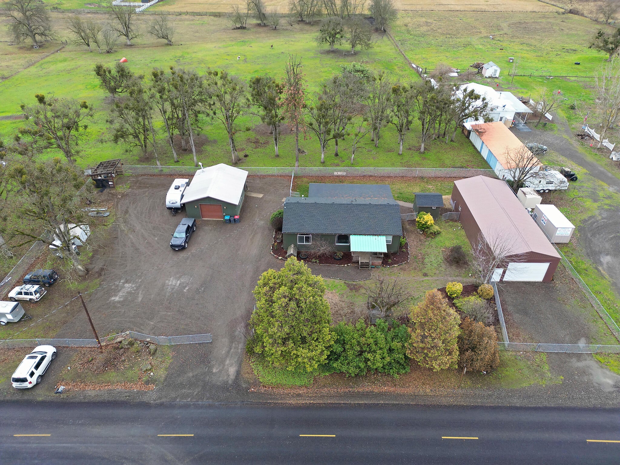 1429 Gibbon Road Central Point, OR 97502 - Photo 1 of 28 Perfect set up! Shop, Home, Garage, RV hook-ups and bonus building with licensed processing kitchen.
