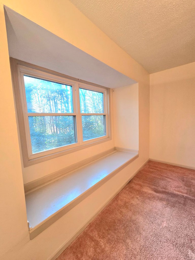6851 Roswell Road Sandy Springs, GA 30328 - Photo 12 of 19 a view of an empty room and window
