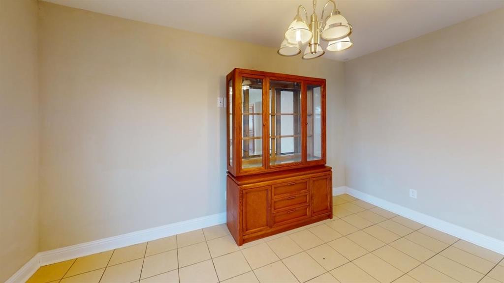 3005 Meandering Way Bedford, TX 76021 - Photo 6 of 22 a view of a chandelier in a room