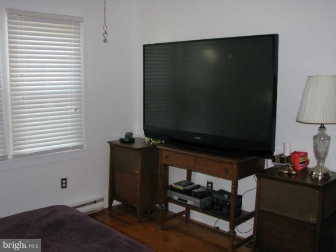 5030 Bethlehem Road Preston, MD 21655 - Photo 14 of 23 a room with furniture and a flat screen tv