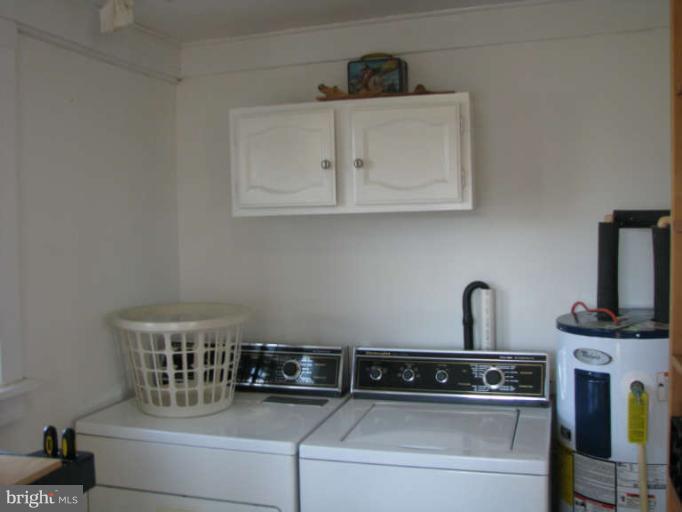 5030 Bethlehem Road Preston, MD 21655 - Photo 7 of 23 a close view of appliances and cabinets