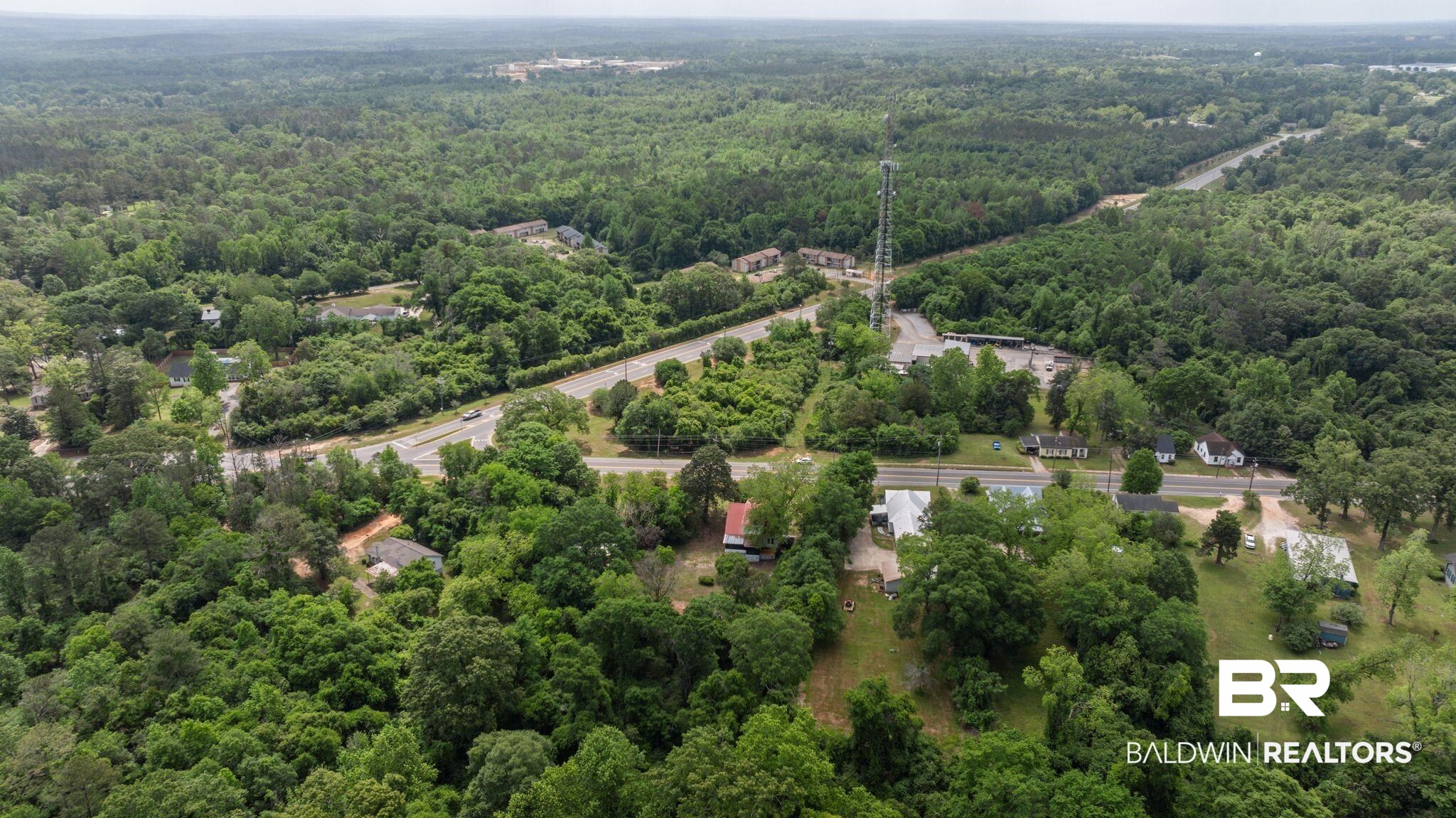 733 Pineville Road Monroeville, AL 36460 - Photo 58 of 68 Birds eye view of property featuring a wooded view