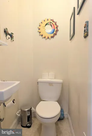 a bathroom with a toilet and a sink