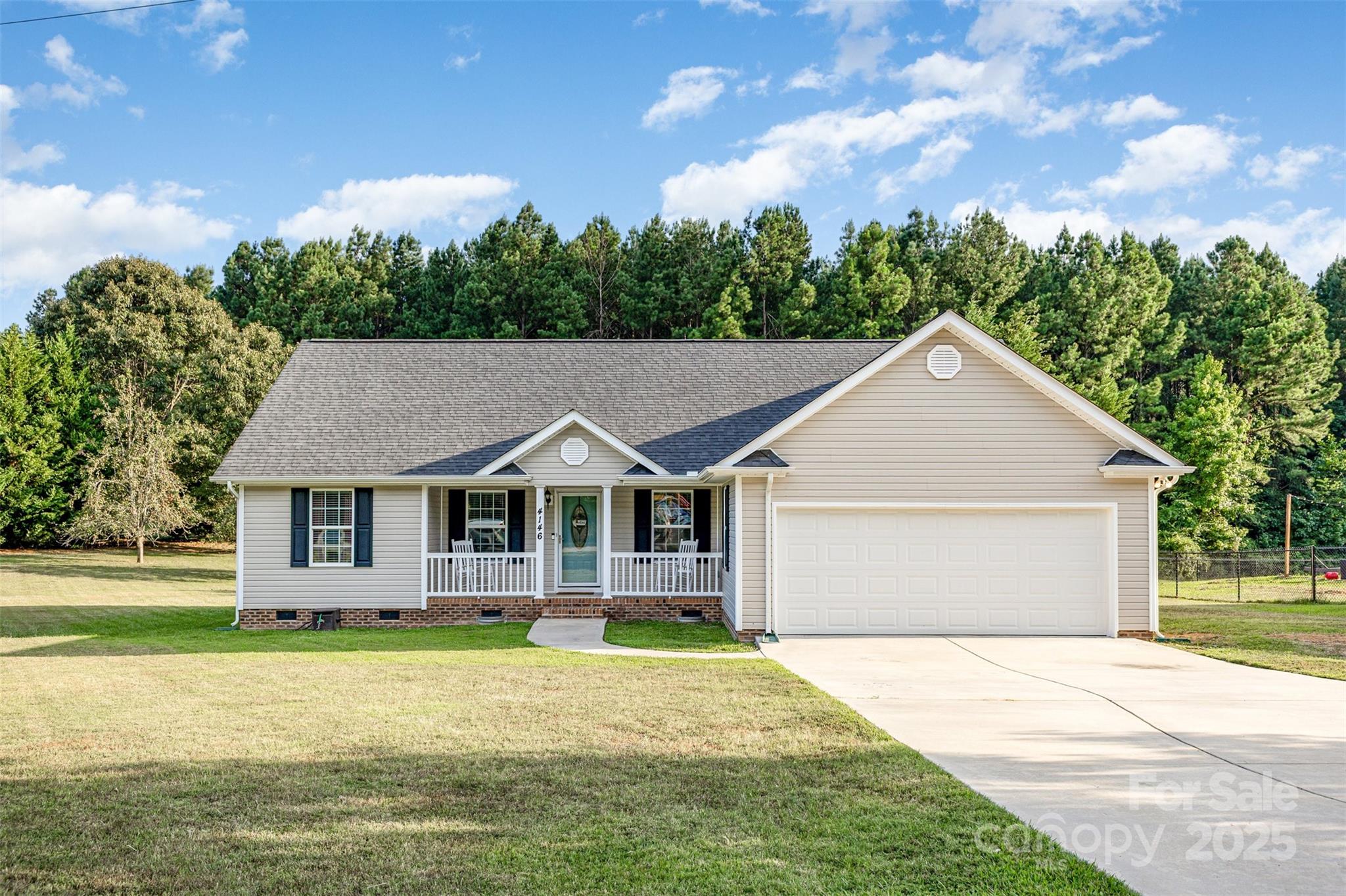 4146 Fletcher Funderburk Road Lancaster, SC 29720 - Photo 3 of 35 a front view of a house with a garden