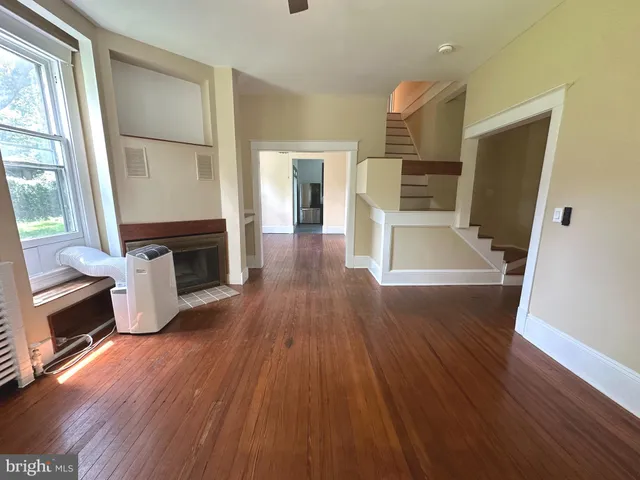 a view of living room with furniture and flat screen tv