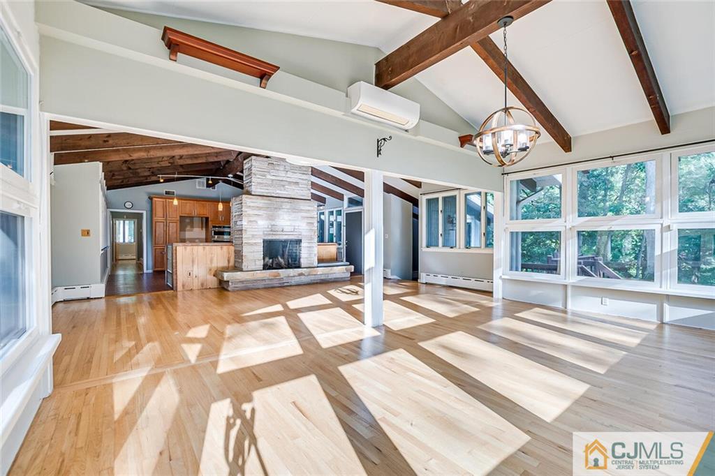 33 Davidson's Mill Road North Brunswick, NJ 08902 - Photo 39 of 58 a view of a hall with wooden floor and windows