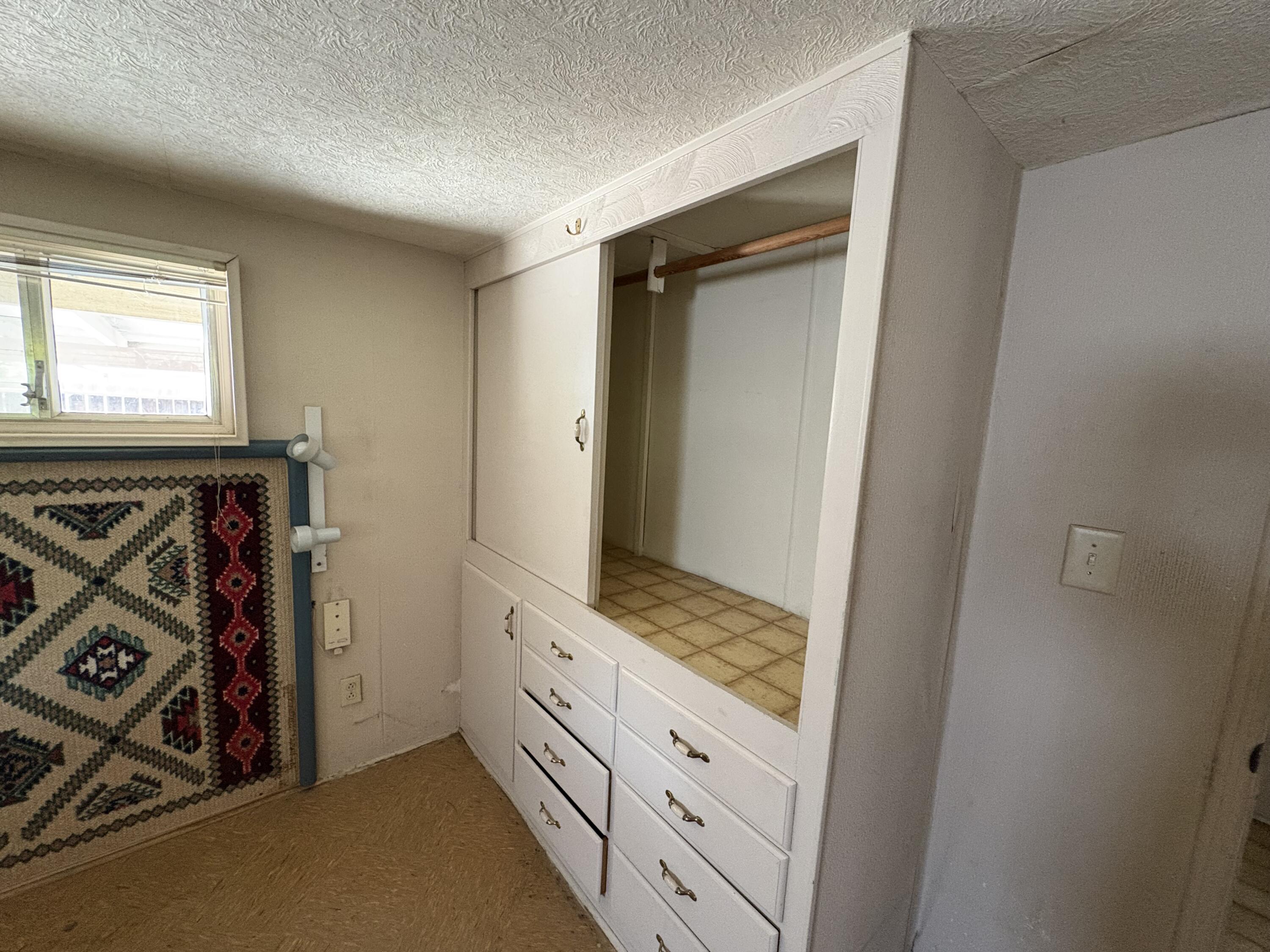 70260 Highway 111, Unit 148 Rancho Mirage, CA 92270 - Photo 21 of 36 a view of walk in closet with clothes