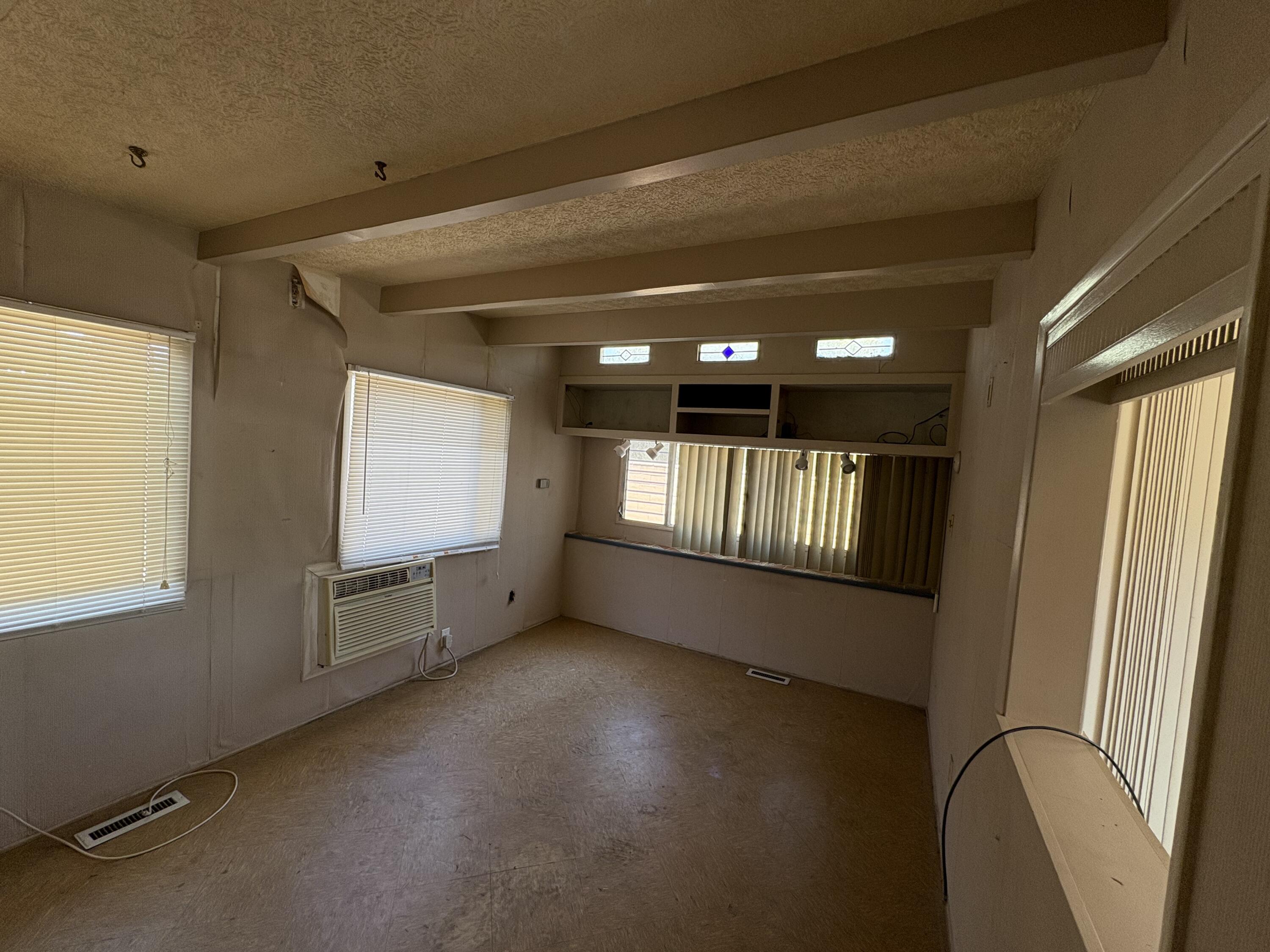 70260 Highway 111, Unit 148 Rancho Mirage, CA 92270 - Photo 27 of 36 a view of an empty room with a window