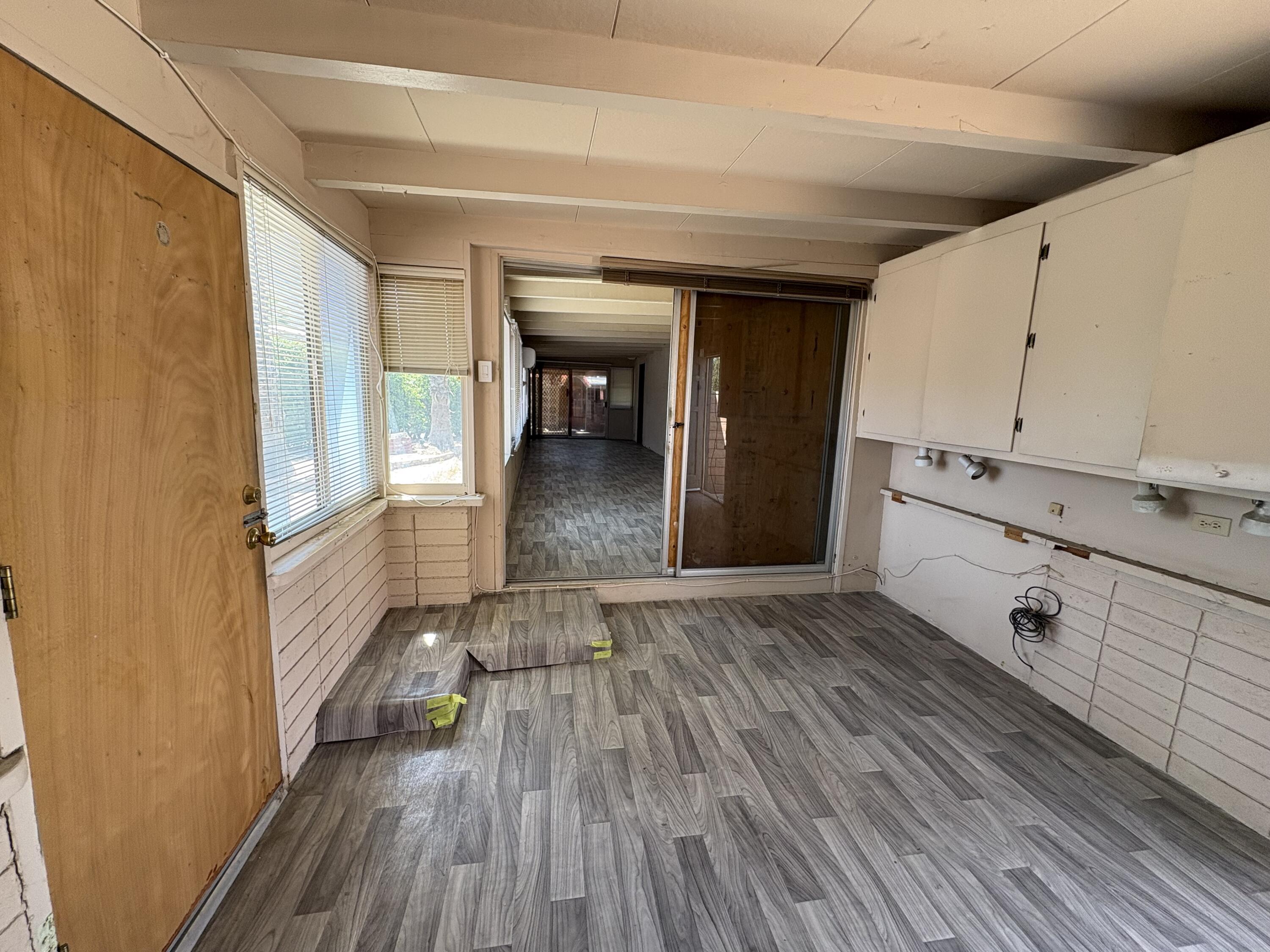 70260 Highway 111, Unit 148 Rancho Mirage, CA 92270 - Photo 31 of 36 a view of a hallway view with wooden floor and staircase