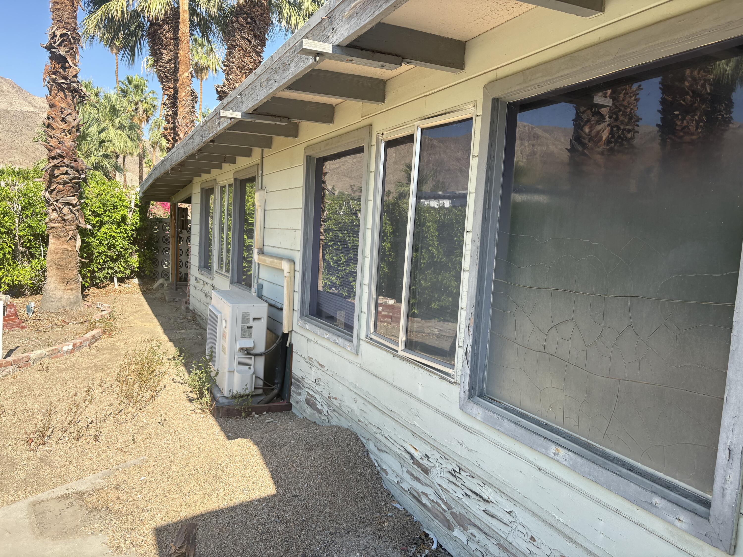 70260 Highway 111, Unit 148 Rancho Mirage, CA 92270 - Photo 5 of 36 a view of a porch with a bench