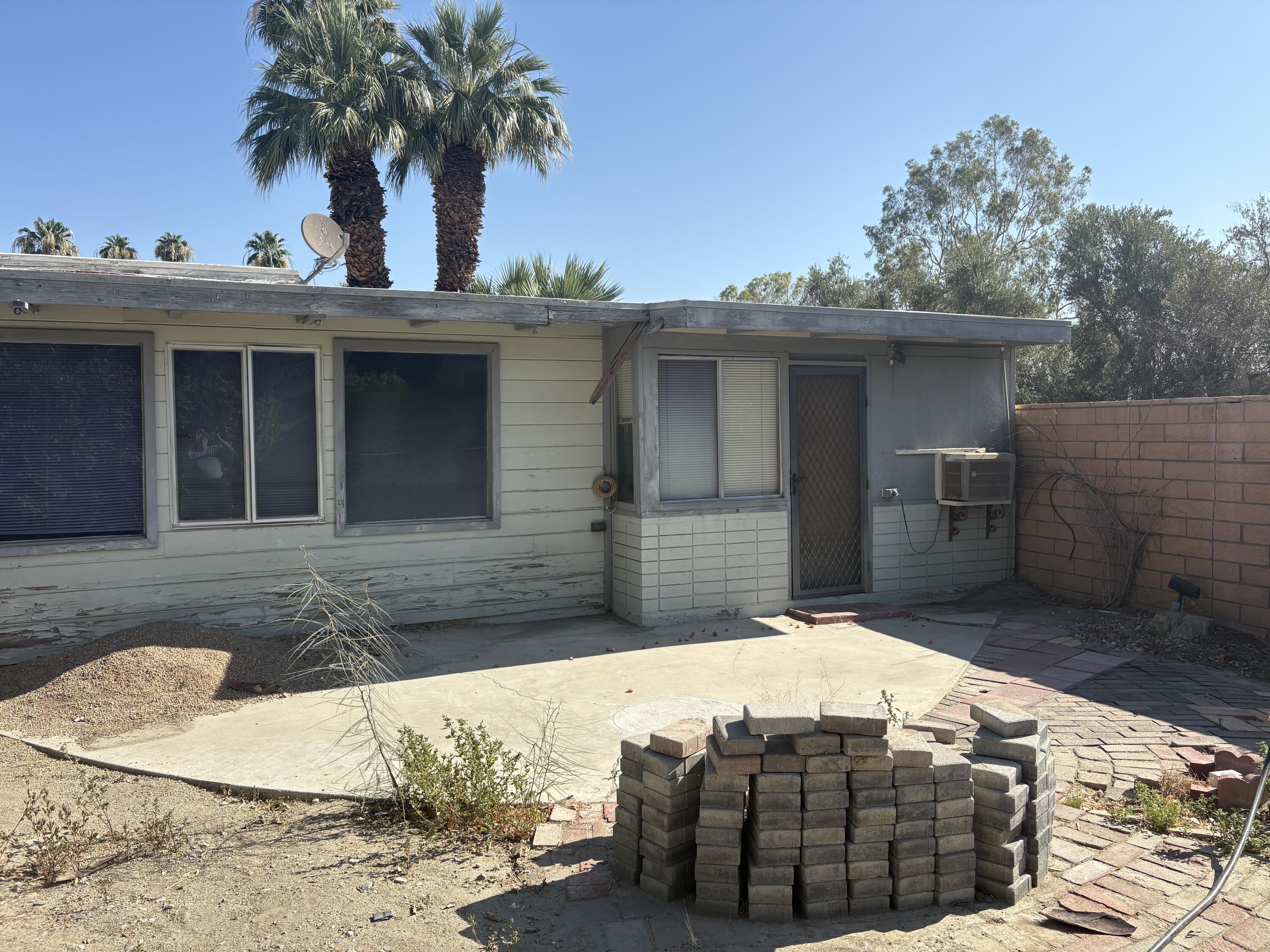 70260 Highway 111, Unit 148 Rancho Mirage, CA 92270 - Photo 6 of 36 a view of outdoor space yard and front view of a house