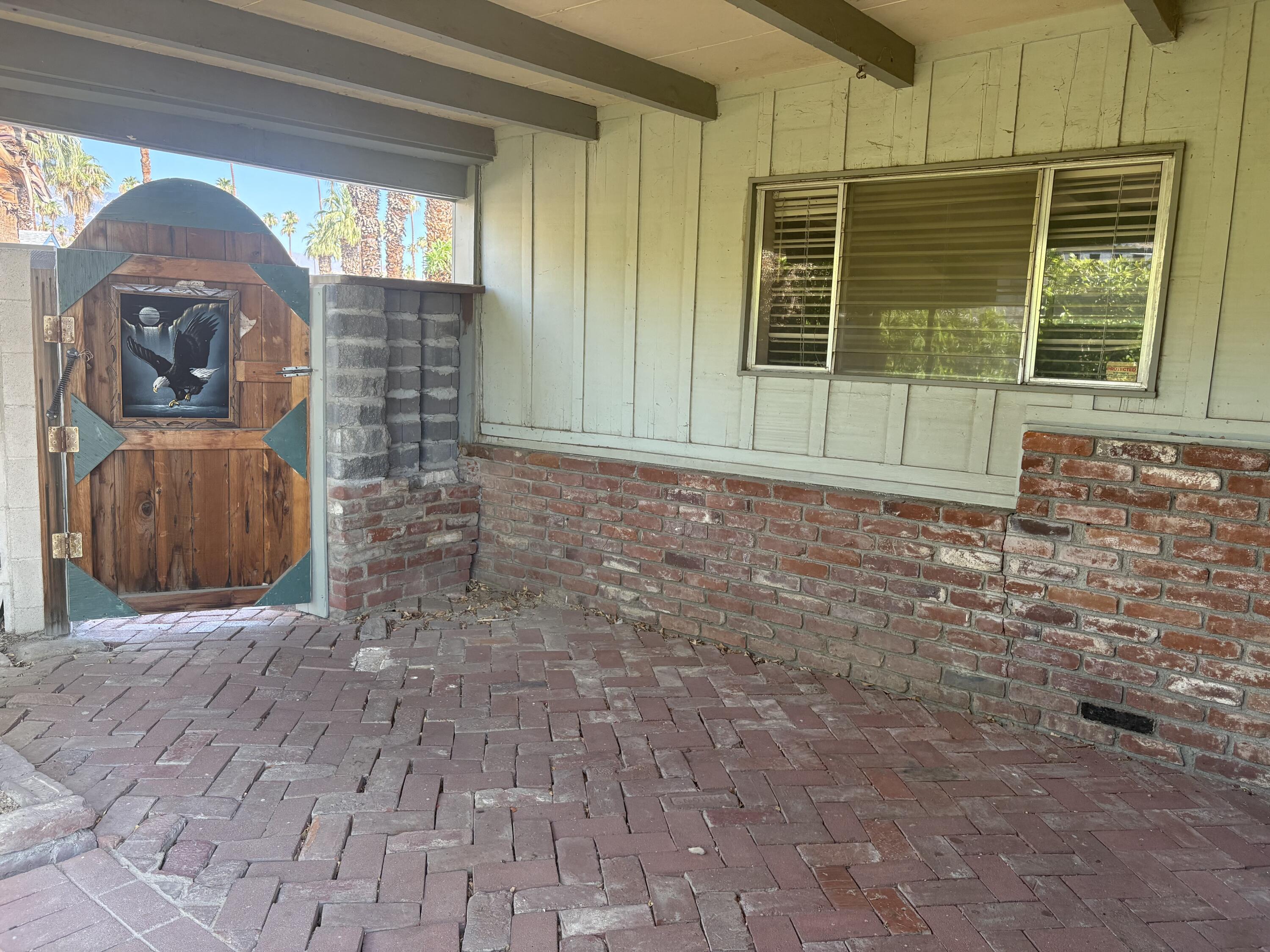 70260 Highway 111, Unit 148 Rancho Mirage, CA 92270 - Photo 10 of 36 a view of front door of house