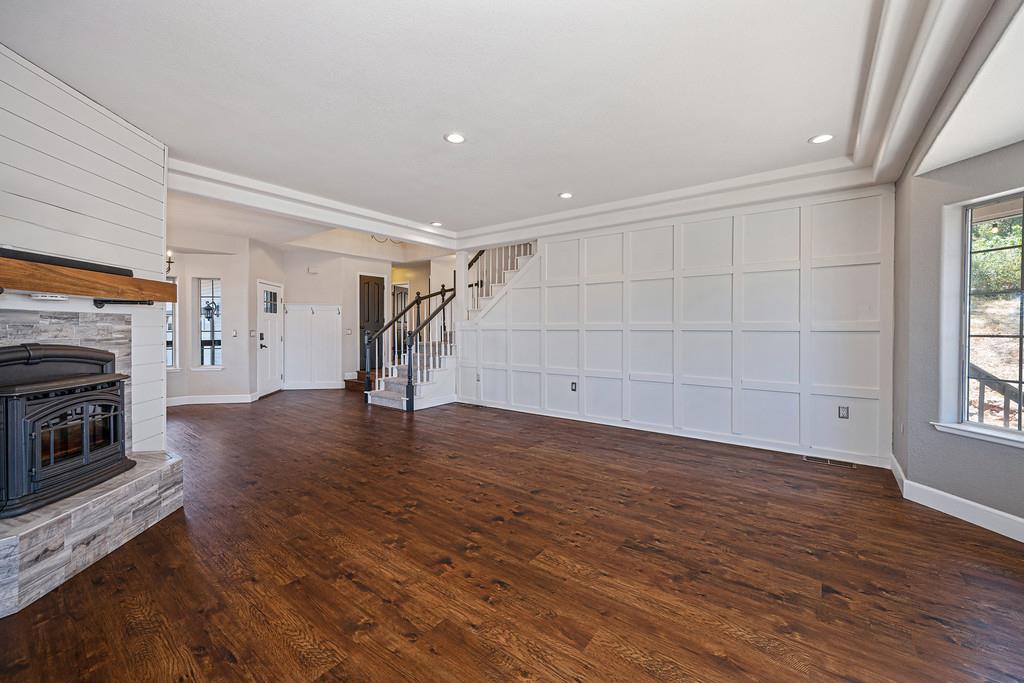 3154 Twin K Road Pilot Hill, CA 95664 - Photo 34 of 89 a view of empty room with wooden floor and fireplace